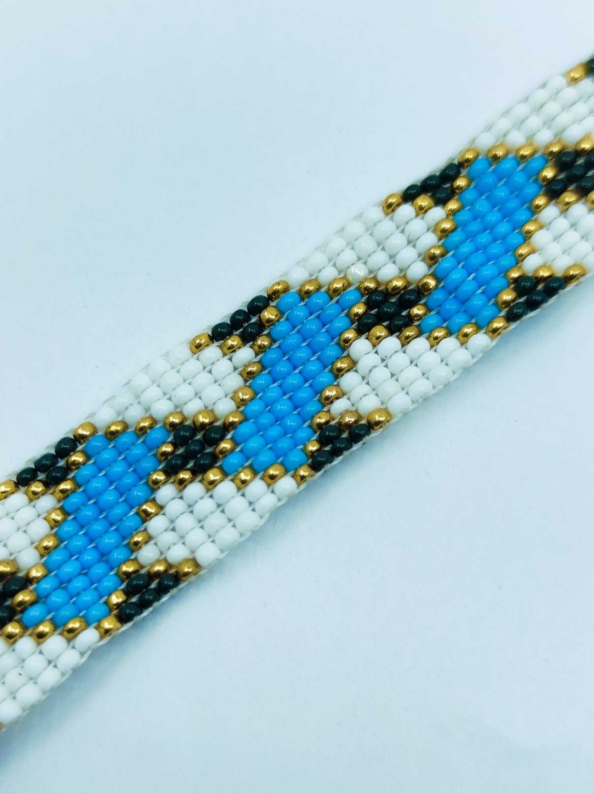 "Aura" Handcrafted Interlocking Blue & Metallic Gold Loom Bracelet