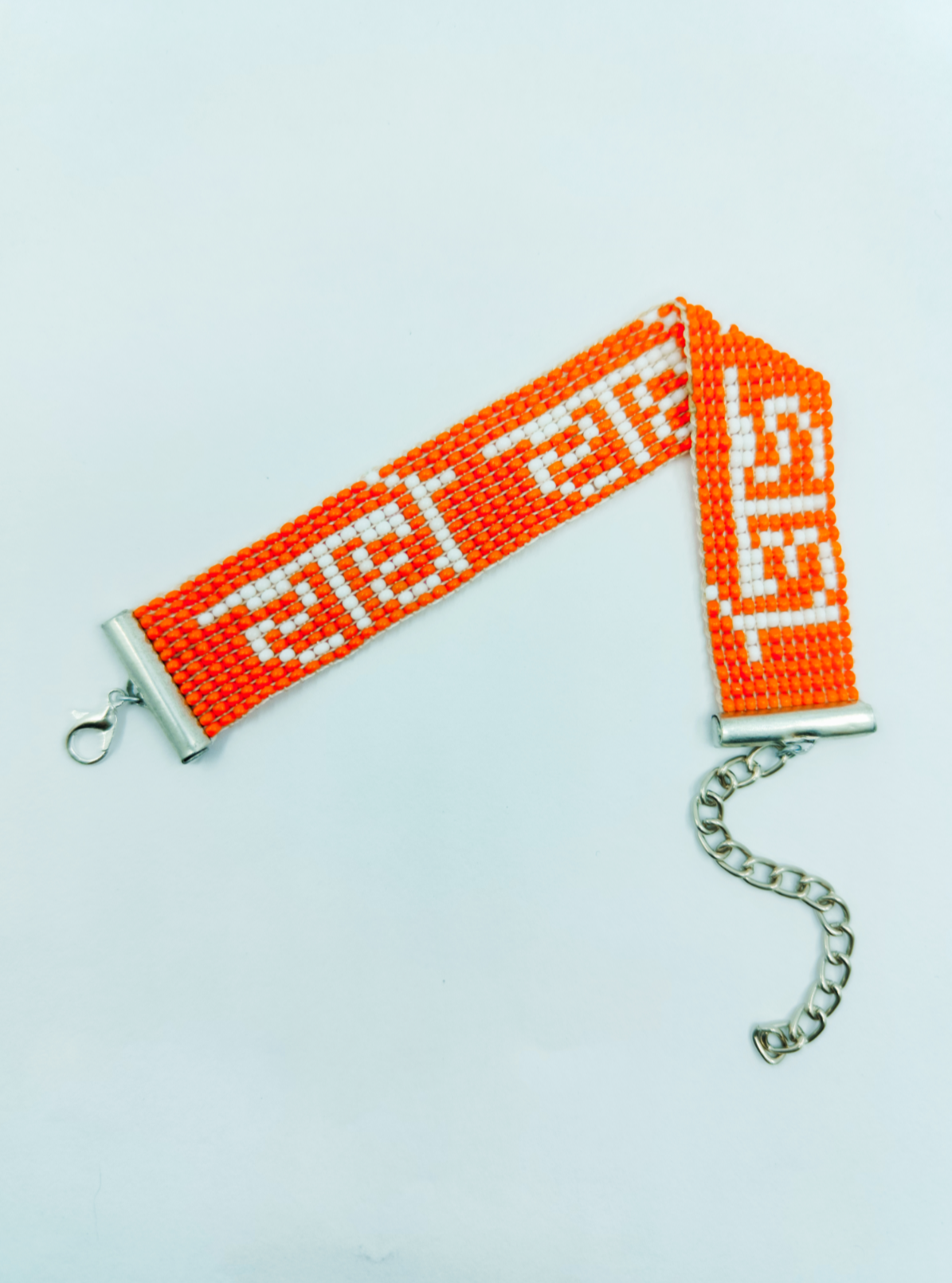 Hand-Woven "Radhe Radhe" Beaded Bracelet in Saffron & White